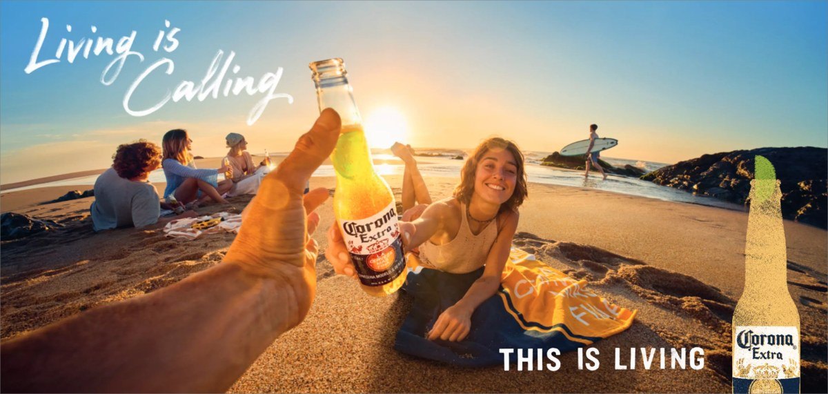 Corona's website banner: a beach at sunset, two bottles clinking, with the words Living is Calling and This is Living