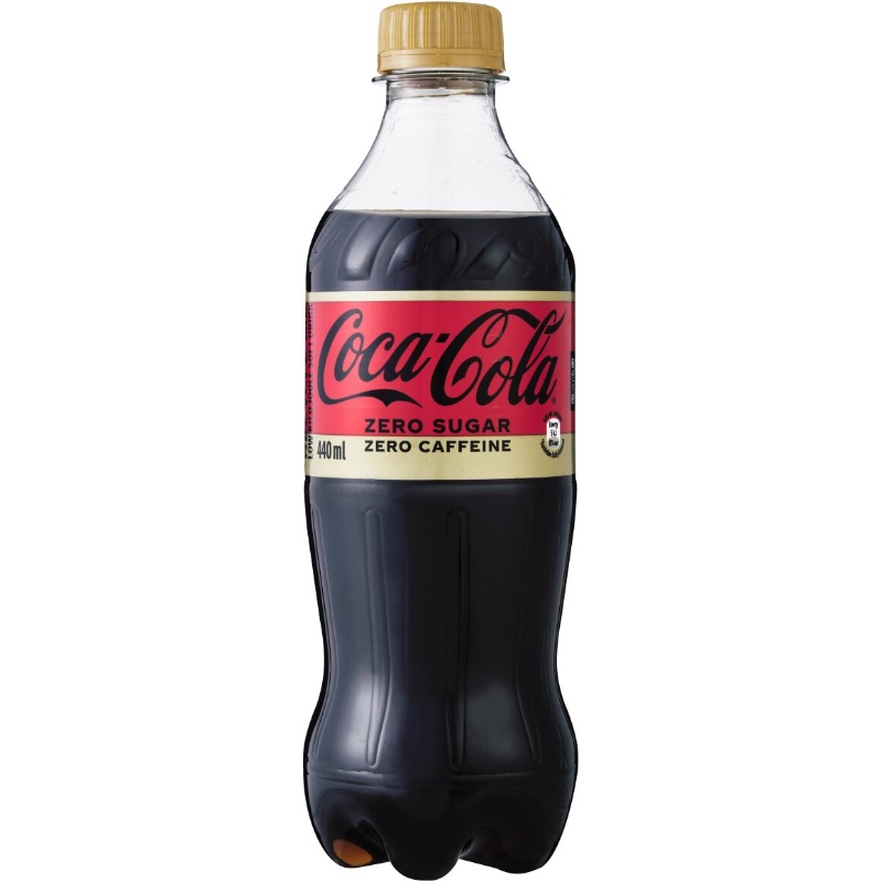 The old Coca-Cola Zero Sugar Zero Caffeine bottle with a red and gold label